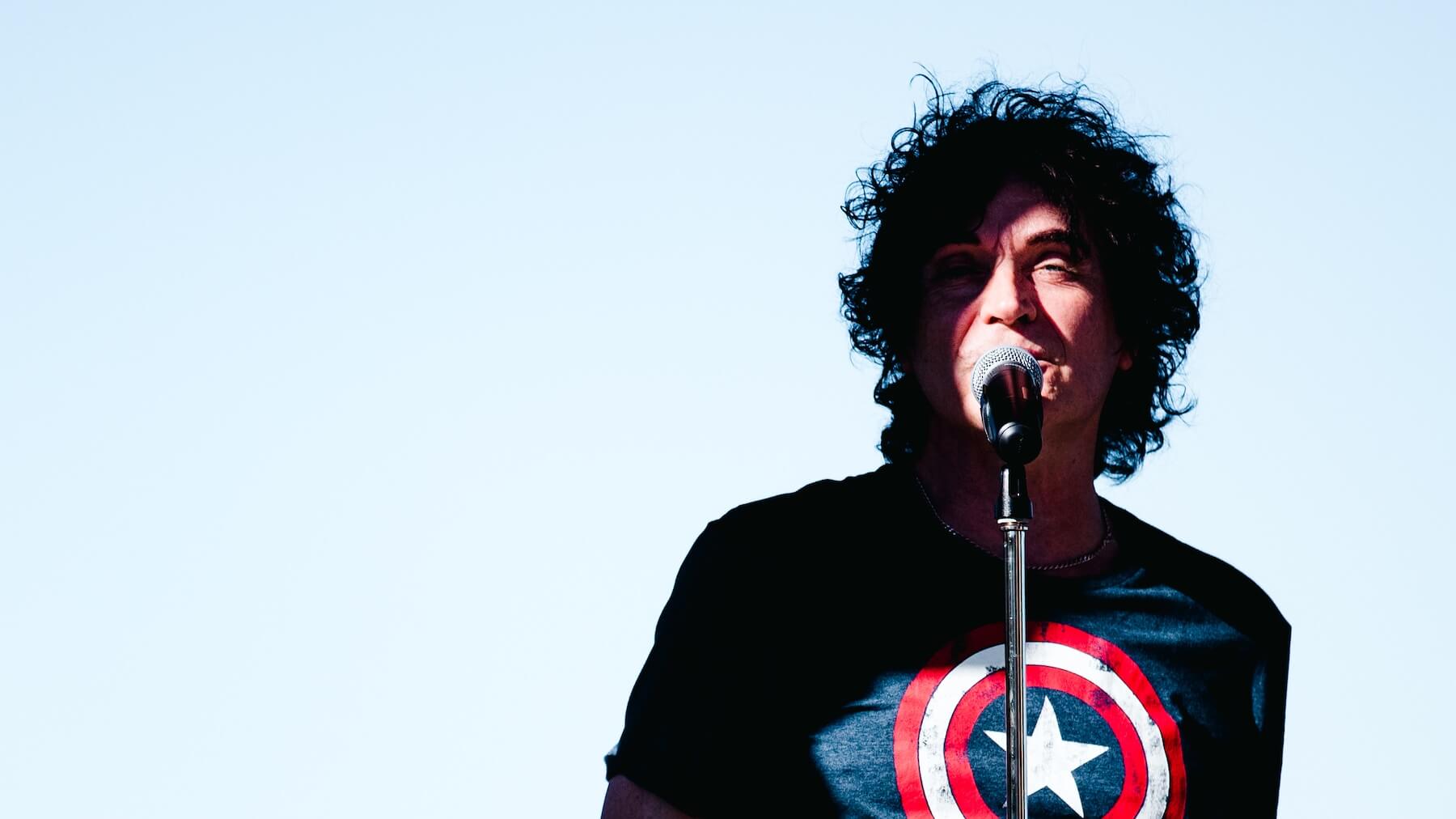 Jon Mullane live photo with microphone